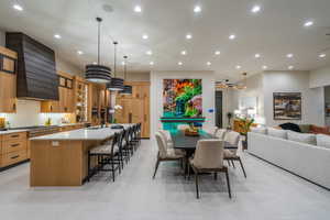 Dining area featuring recessed lighting
