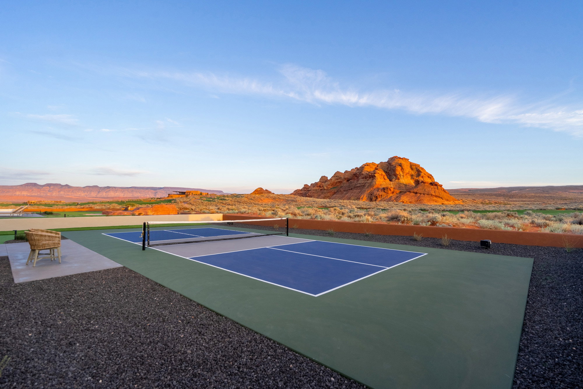 View of tennis court with a mountain view