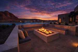View of patio / terrace with an outdoor fire pit