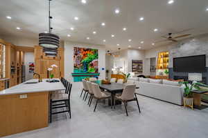 Dining room featuring recessed lighting and a ceiling fan