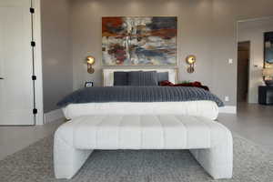 Bedroom featuring baseboards
