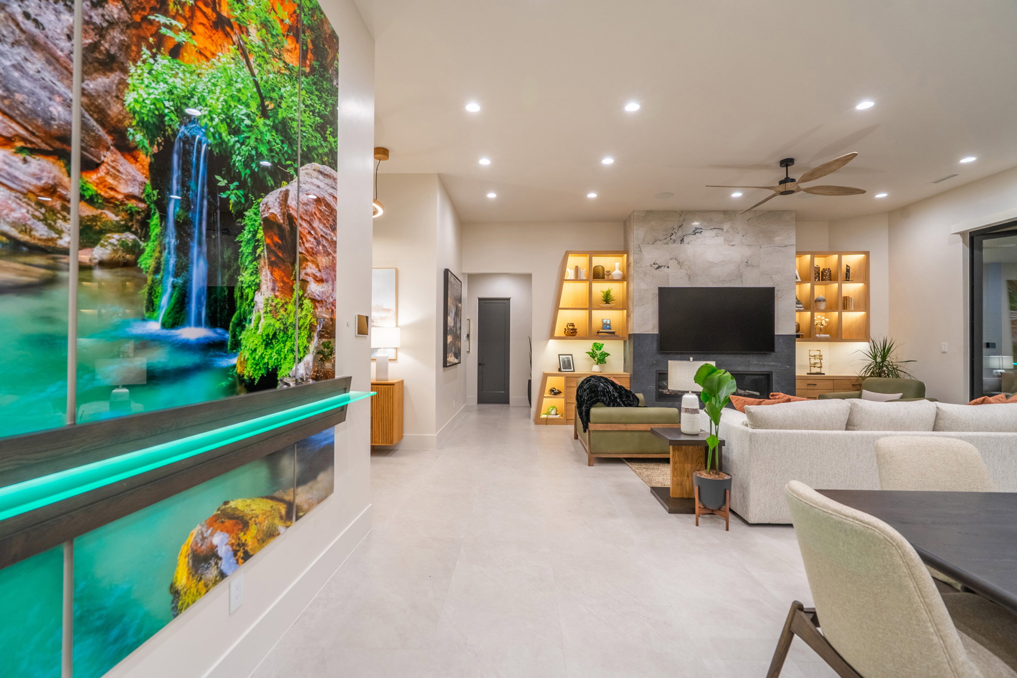 Living area with recessed lighting and ceiling fan