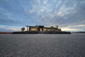 Modern home featuring stone siding