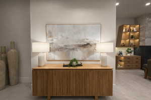 Home office featuring radiator heating unit and recessed lighting