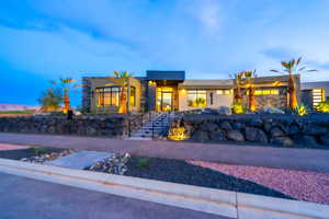 Modern home featuring stucco siding
