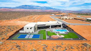 Drone / aerial view of a pool and mountains