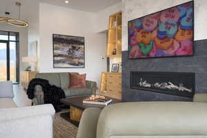 Living area featuring a high end fireplace and recessed lighting