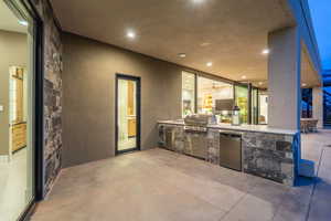 View of patio / terrace with an outdoor kitchen