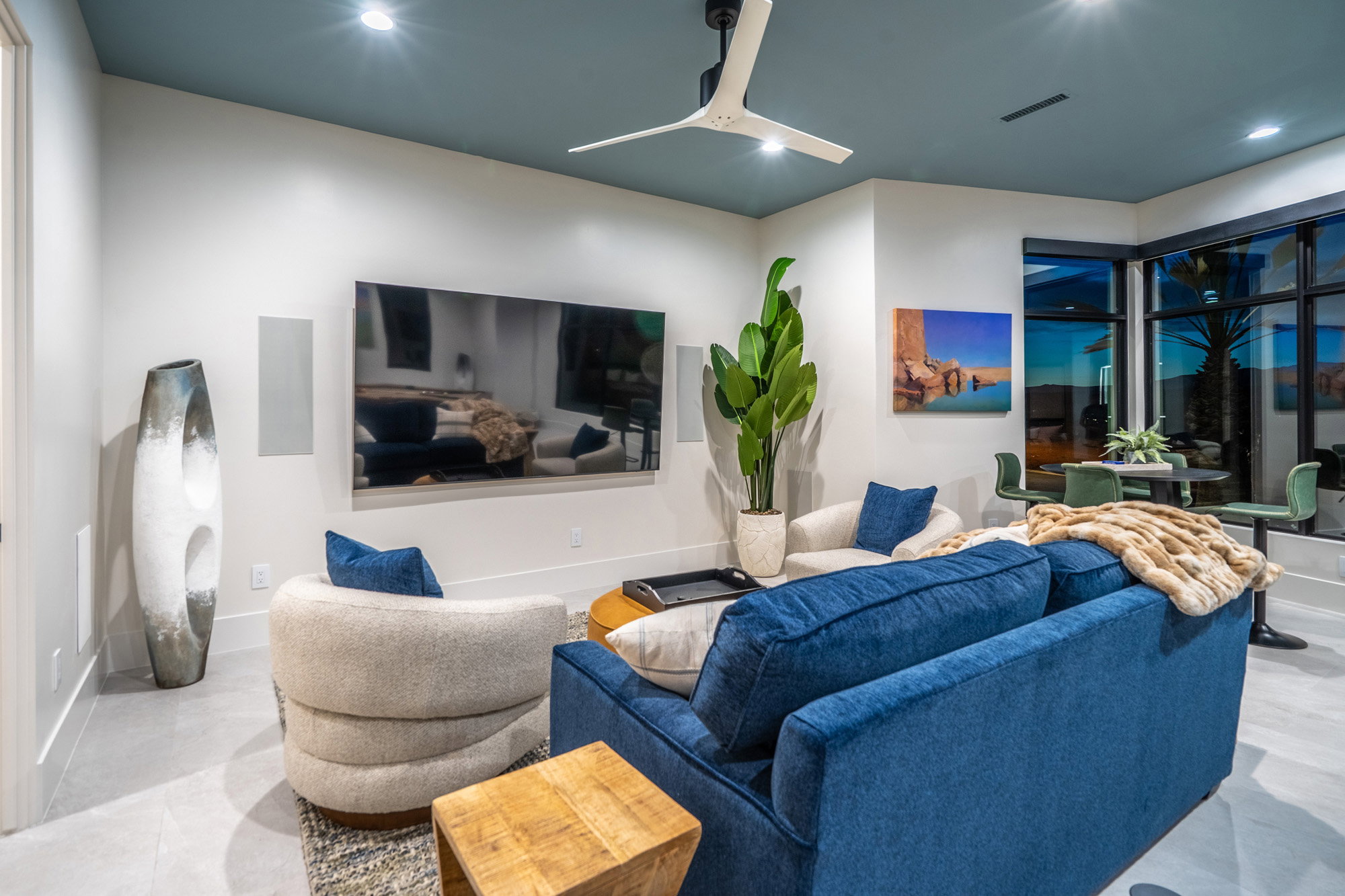 Living room with recessed lighting and ceiling fan