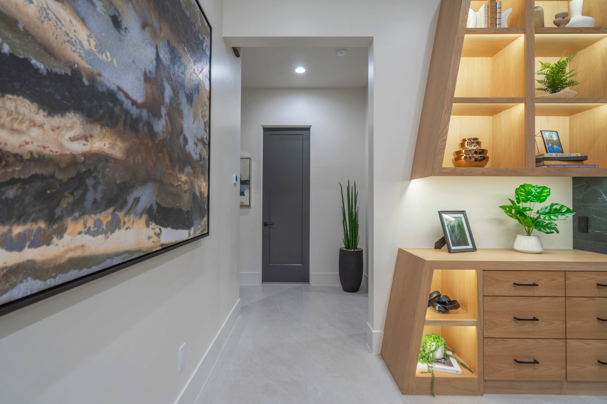 Corridor featuring recessed lighting and concrete floors