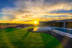 View of community with a swimming pool and a patio area