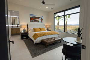 Bedroom featuring a ceiling fan, recessed lighting, and light tile patterned floors