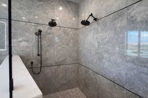 Full bathroom with a tile shower