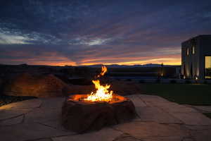 View of patio / terrace featuring a mountain view and an outdoor fire pit