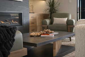 Dining room featuring a glass covered fireplace