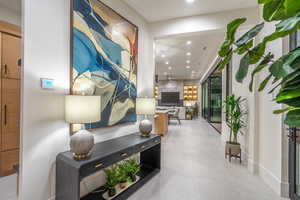 Hall featuring recessed lighting and a sauna