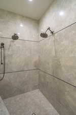 Full bathroom with tiled shower