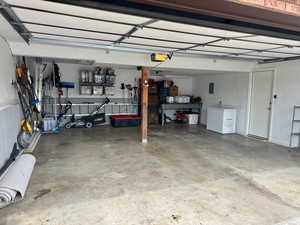 Garage featuring a garage door opener