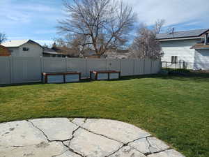 View of fenced backyard