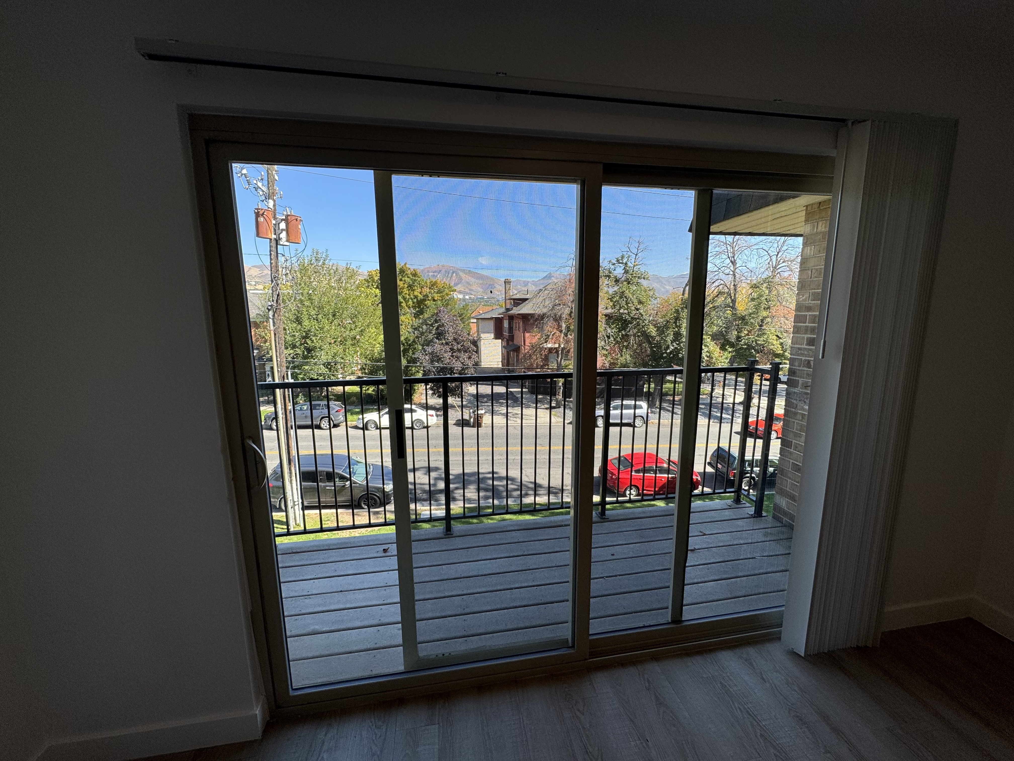 Entryway with baseboards and wood finished floors