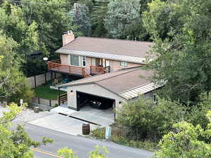 View from above of property, garage open