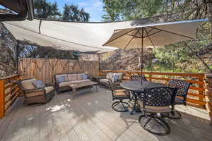 Wooden terrace with outdoor lounge area