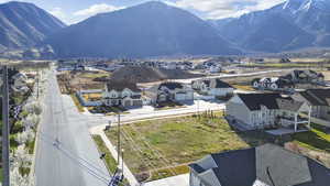View of mountain backdrop featuring nearby suburban area