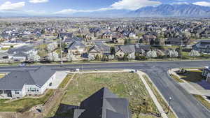 Aerial view of residential area with a mountainous background