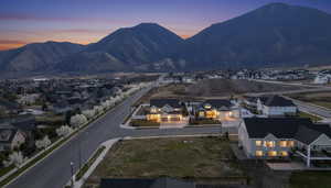 View of mountain background featuring nearby suburban area