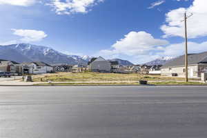 View of mountain backdrop with nearby suburban area