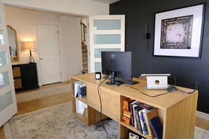 Office space featuring light wood-style flooring