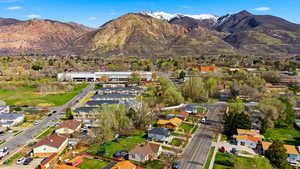 Aerial perspective of suburban area featuring mountains