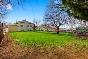 View of fenced backyard