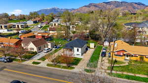 Aerial perspective of suburban area with a mountain backdrop