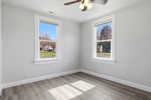 Bedroom featuring light wood-style flooring and ceiling fan
