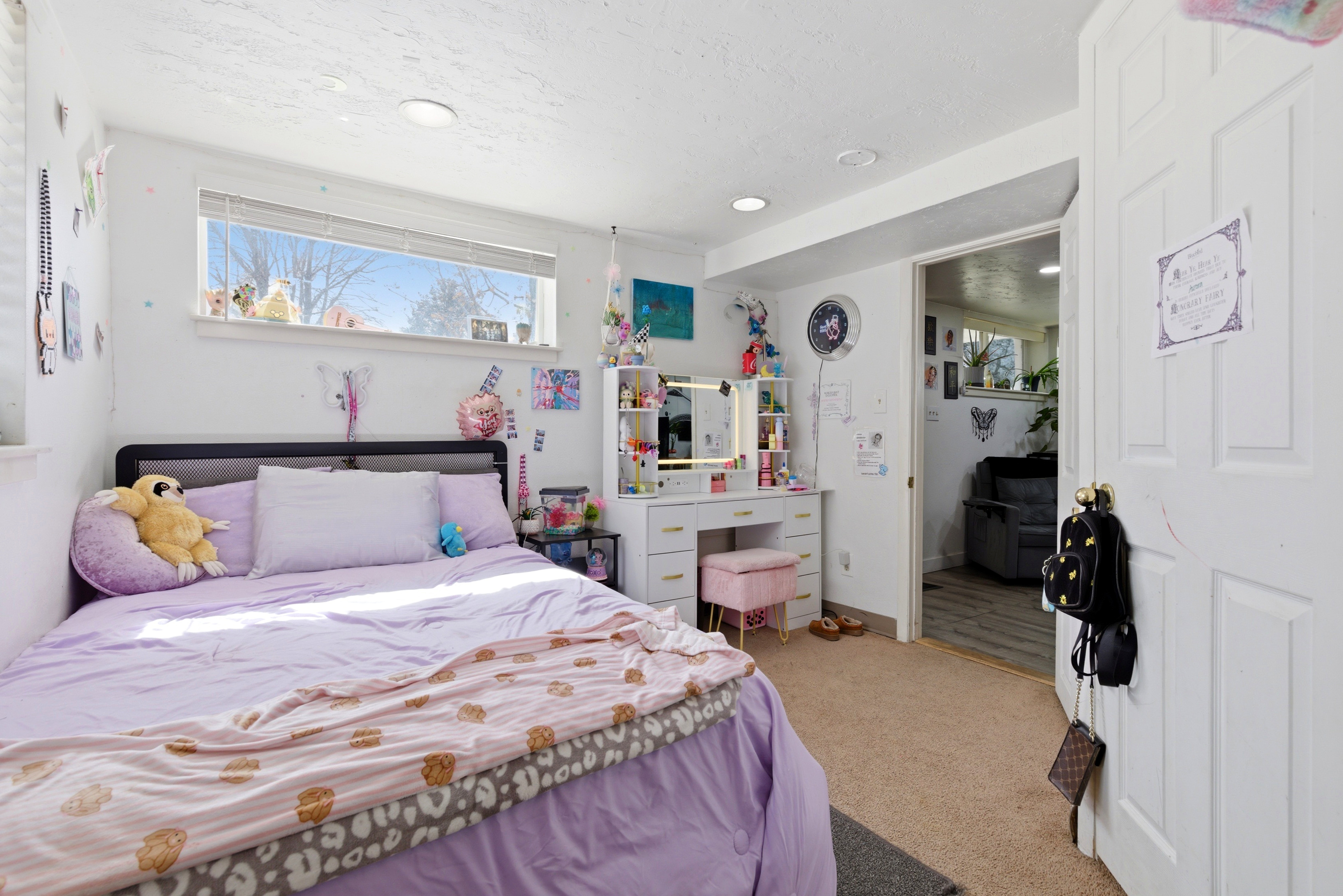 Bedroom with light carpet