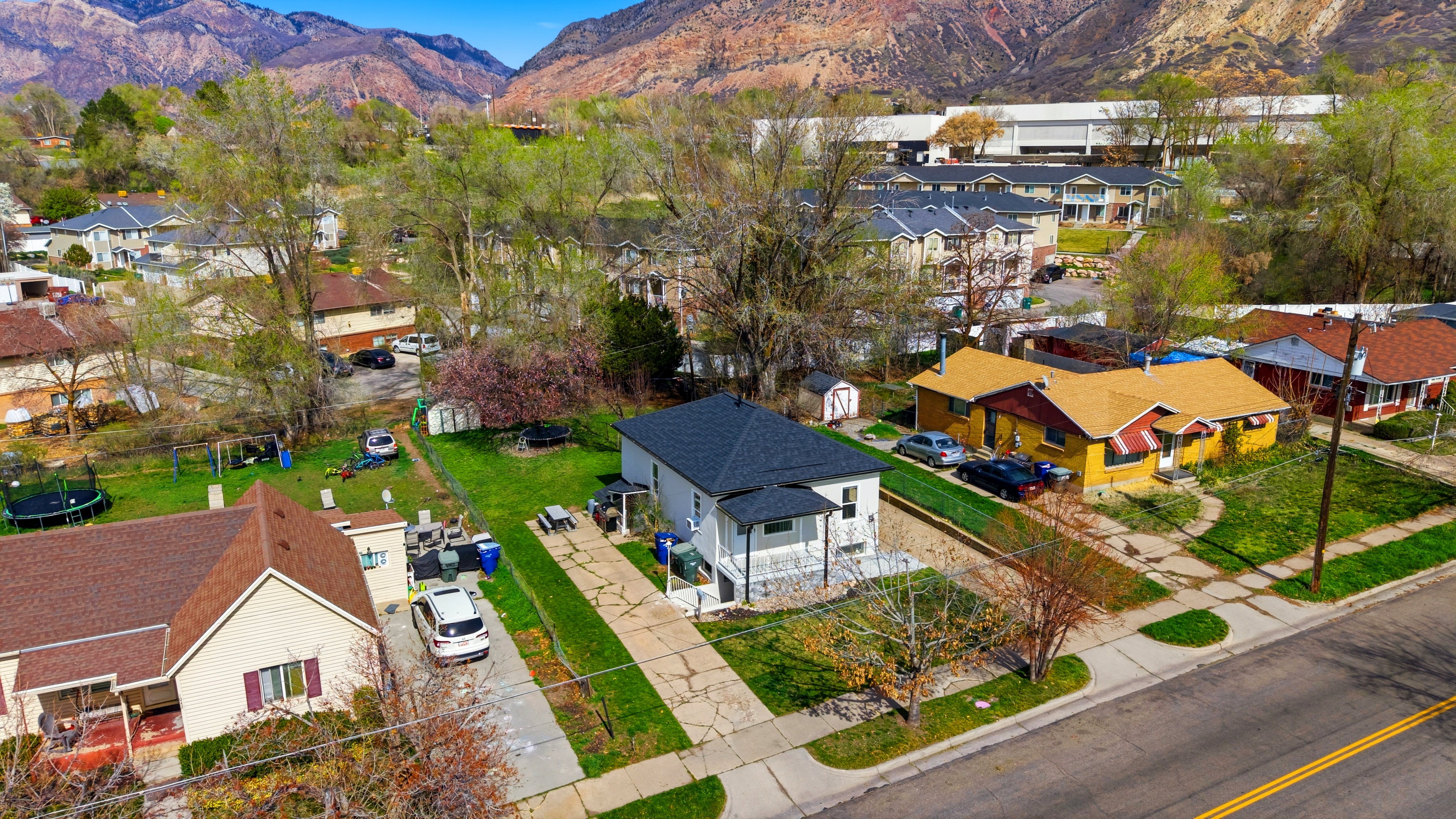Aerial view of residential area with a mountain backdrop