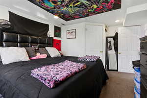 Bedroom featuring carpet and recessed lighting