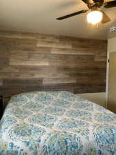 Bedroom featuring a ceiling fan