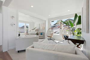 Living area featuring recessed lighting and wood finished floors