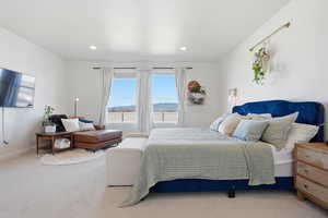 Bedroom featuring carpet floors, a mountain view, and recessed lighting