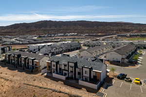 Aerial view of residential area with a mountainous background