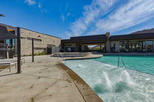 Community pool featuring a patio area