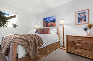 Bedroom featuring carpet flooring