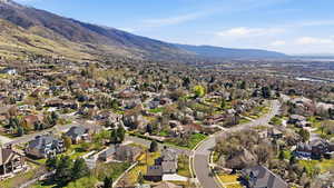 Aerial view of residential area featuring mountains