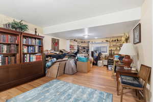 Living area featuring light wood-style flooring