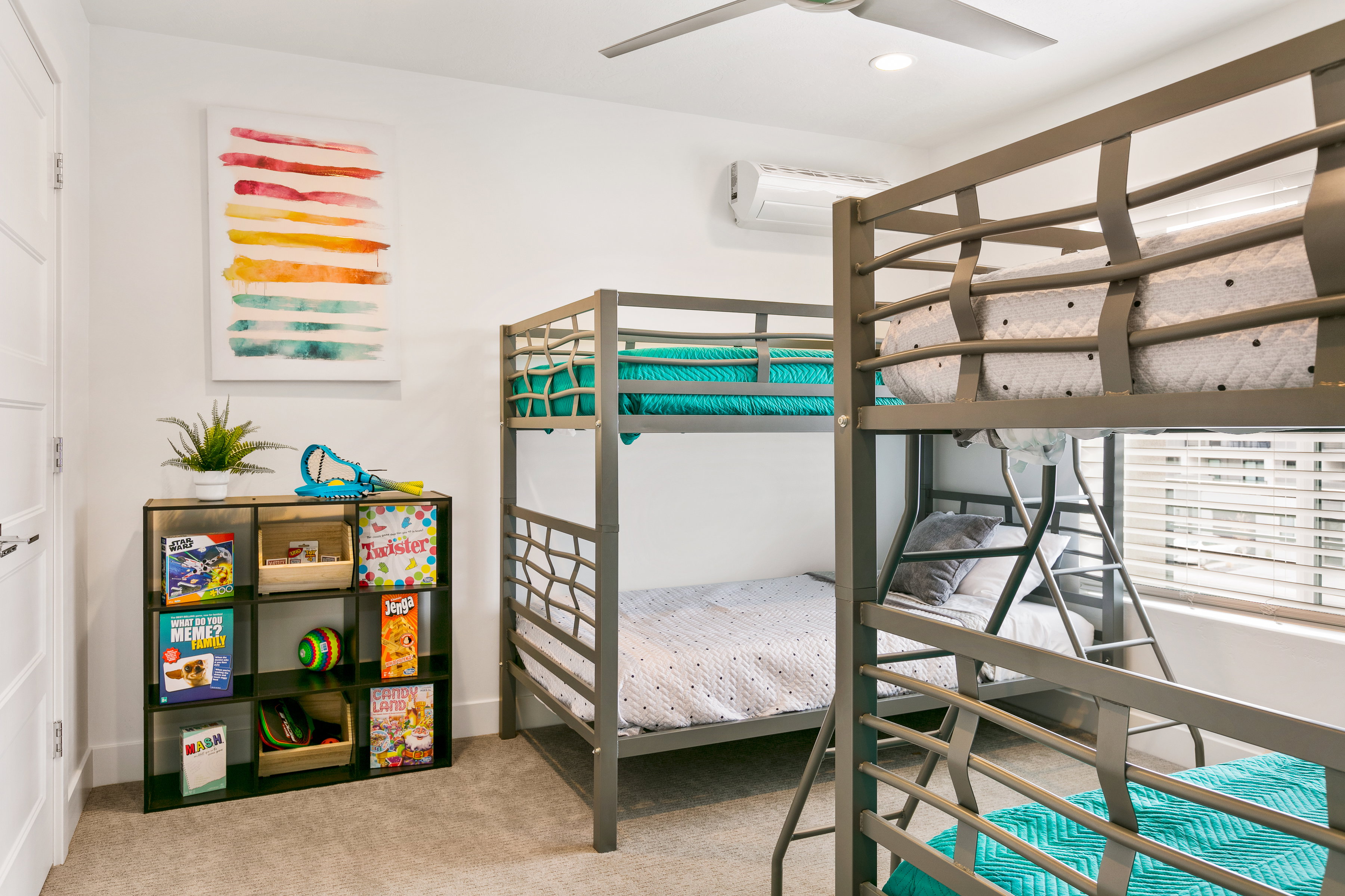 Bedroom with light colored carpet, a ceiling fan, and recessed lighting