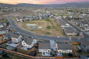 Aerial view at dusk of a residential view and a mountain view
