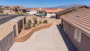 View of patio / terrace with a residential view and a mountain view