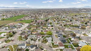 Aerial view of residential area featuring mountains